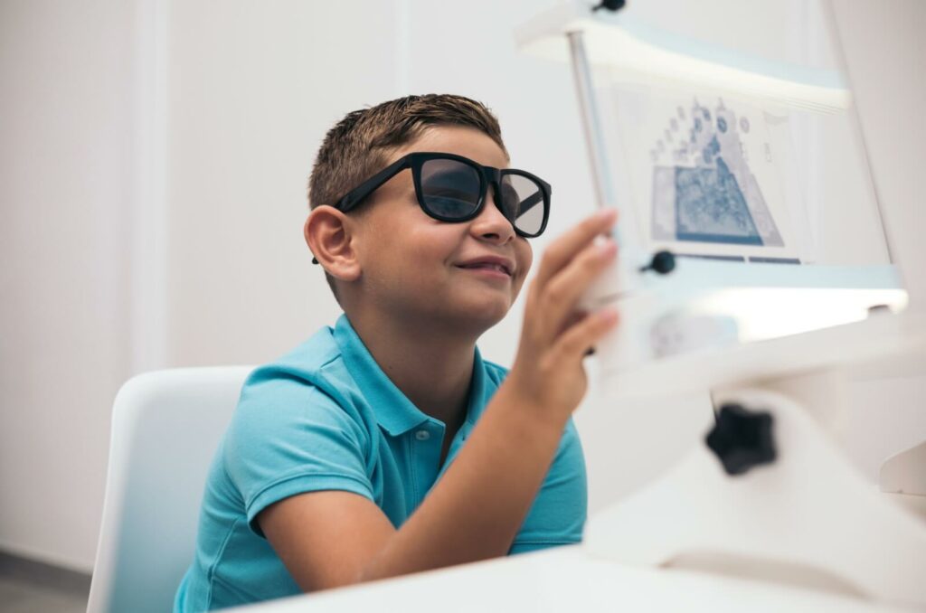 A child in vision therapy completes an activity that aims to improve visual skills.